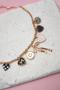 Bow checker heart charm necklace